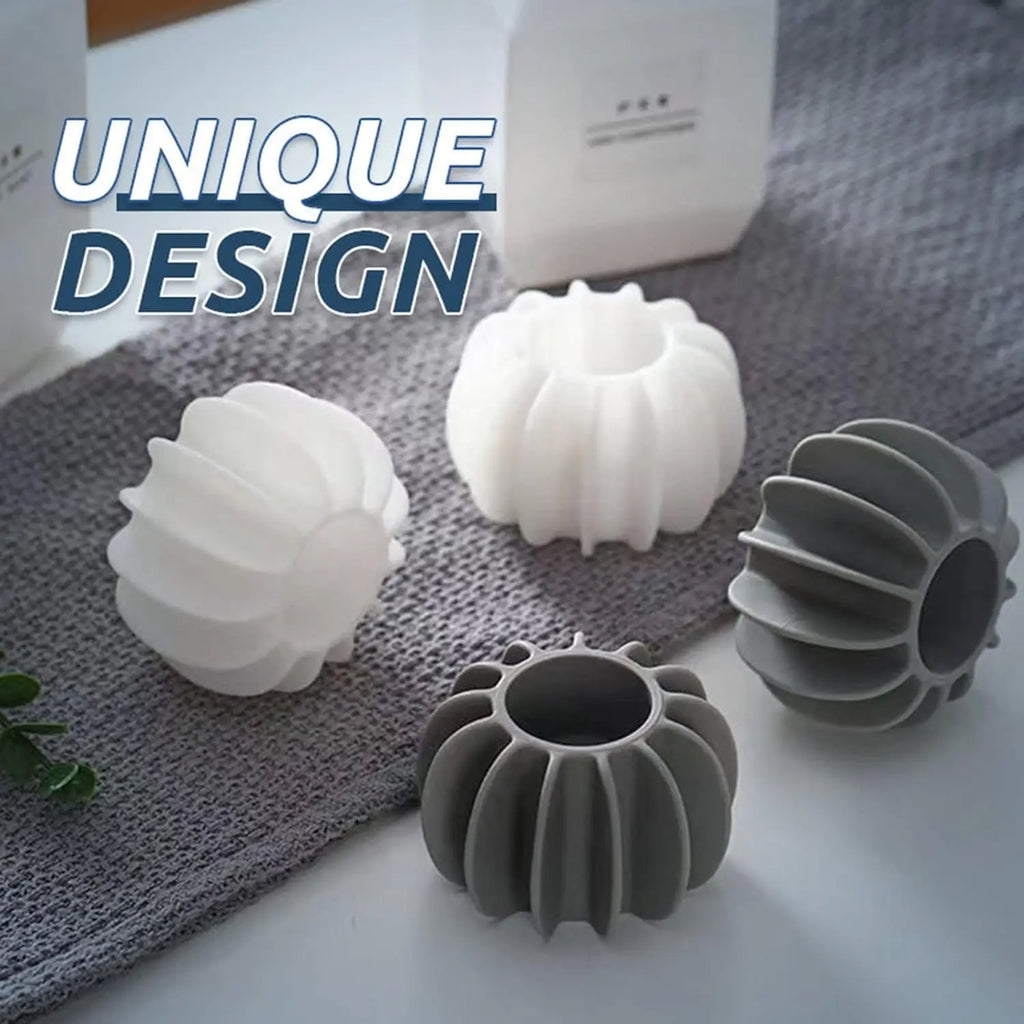 Reusable silicone laundry balls in white and gray for removing cat and dog hair from clothes in the washing machine.