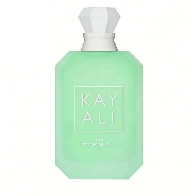 Kayali Yum Pistachio Gelato 33 unisex EDP: green frosted glass bottle with diamond-cut cap, 100ml luxury fragrance.