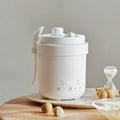 White 600ml mini electric rice cooker with ceramic non-stick inner pot and lid