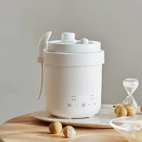 White 600ml mini electric rice cooker with ceramic non-stick inner pot and lid
