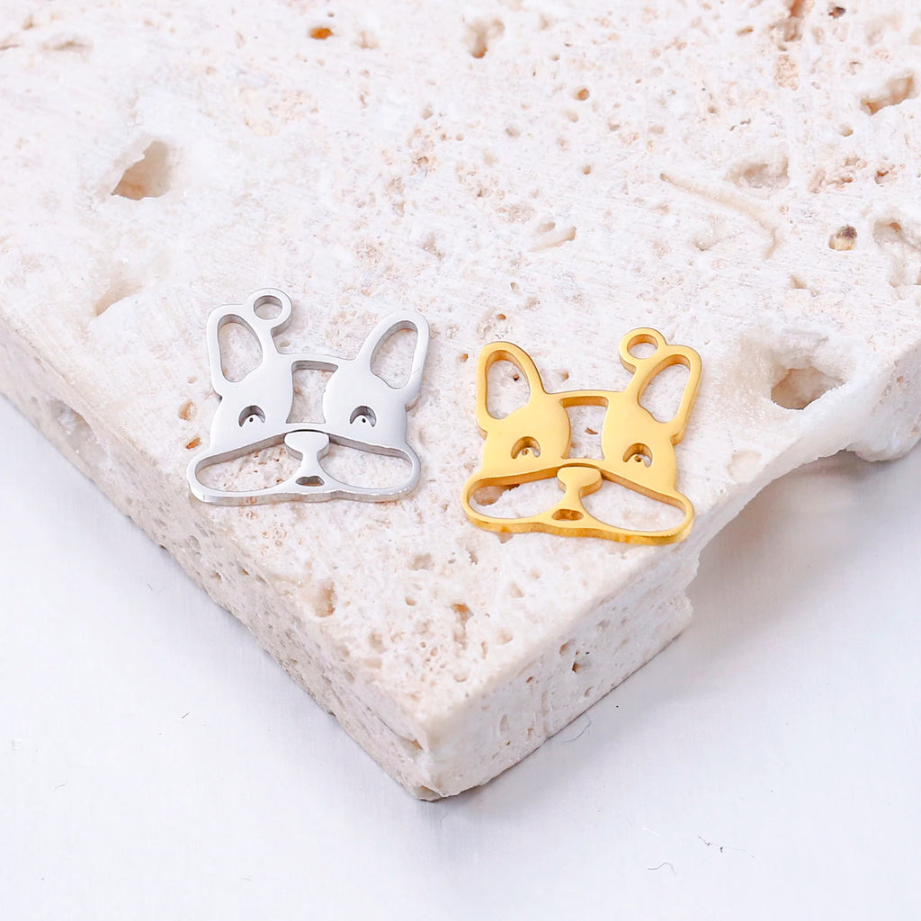 Gold and silver stainless steel French bulldog charms for DIY jewelry making, bracelets, and necklaces.