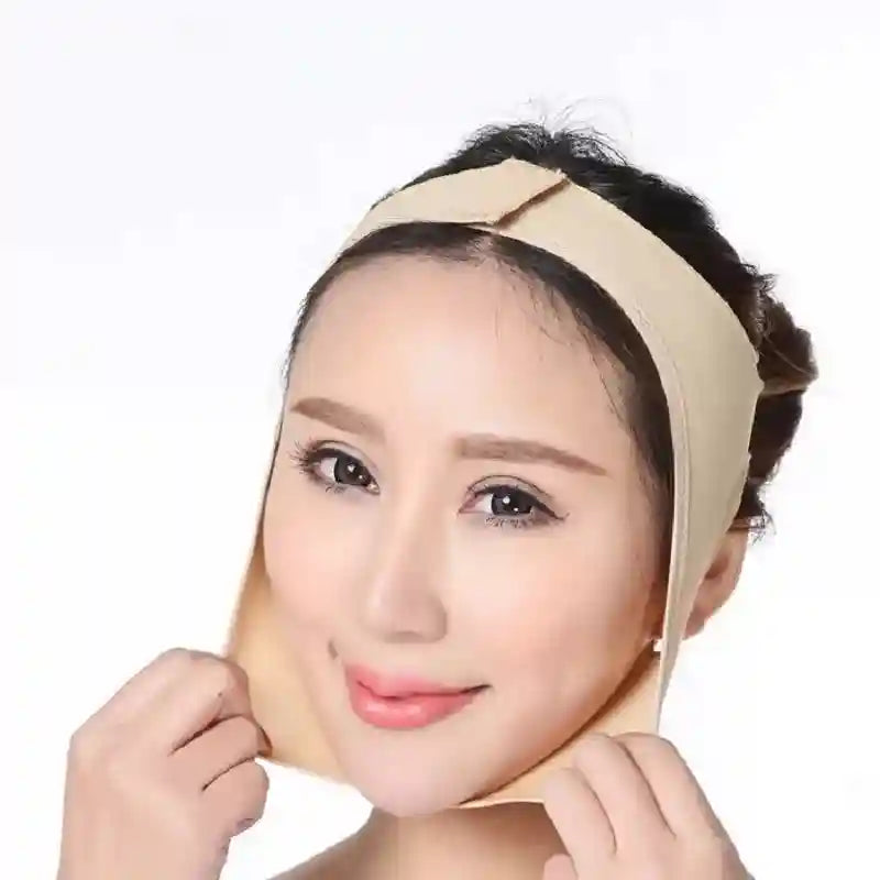 A woman wearing a beige, elastic V-line face slimming bandage strap secured over the head and under the chin.