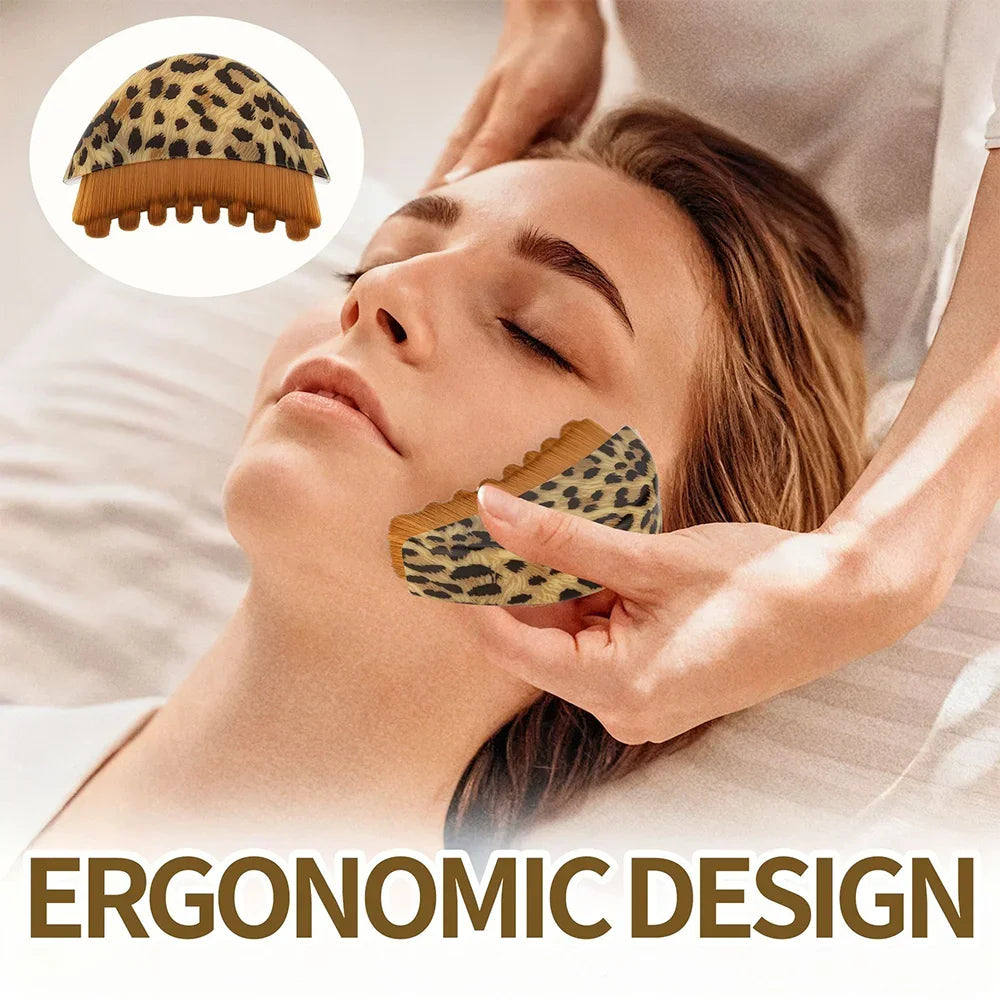 Leopard print lymphatic contour face massage brush being used on a woman’s jawline.