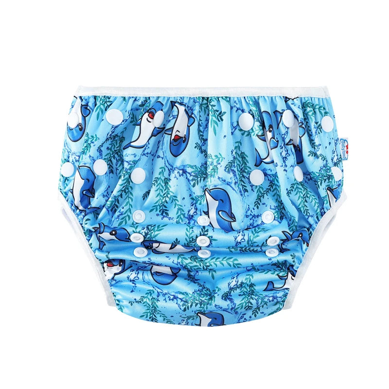 BabyLand reusable cloth diaper in light blue with dolphin print and adjustable snap buttons for baby care.