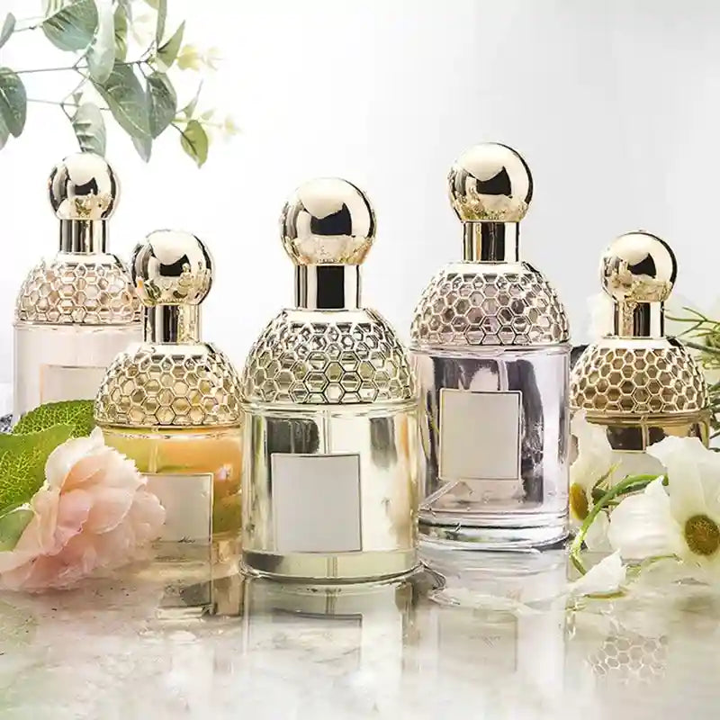 Flora Water Women's EDT: Floral fruity perfume in a round 100ml glass bottle with a gold honeycomb cap. Summer scent.