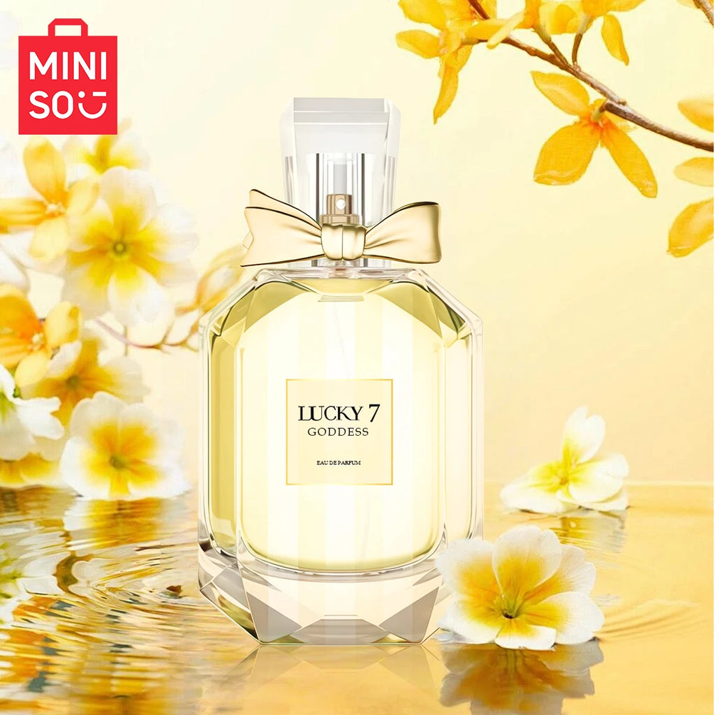 MINISO Lucky 7 Goddess floral EDP, 100ml women’s perfume in a faceted glass bottle with gold bow, luxury fragrance.