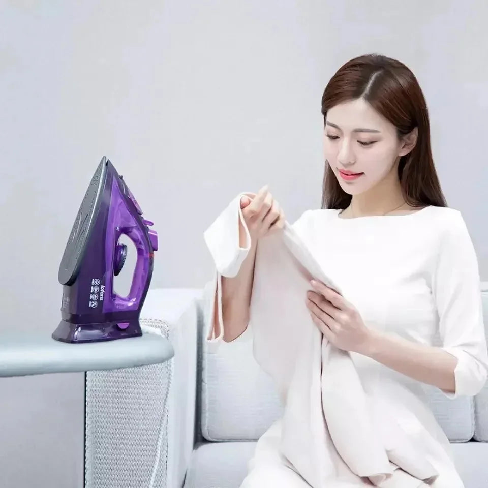 Tidesmit Lofans YD-012V cordless steam iron showing water tank and handheld design for garment steaming.