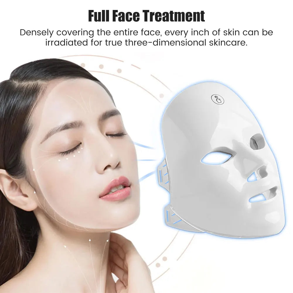A person next to a smooth, white, ergonomic LED light therapy face mask with cutouts for eyes, nose, and mouth.