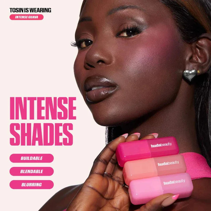 Huda Beauty hydrating lip and cheek blush stick in Intense Guava for a blendable, natural, buildable cream finish.