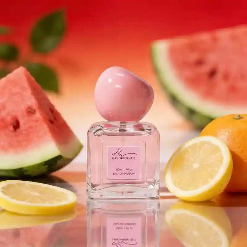 Hope Christine Watermelon Eau De Parfum for women. 50ml fresh citrus scent in a square bottle with pink round cap.
