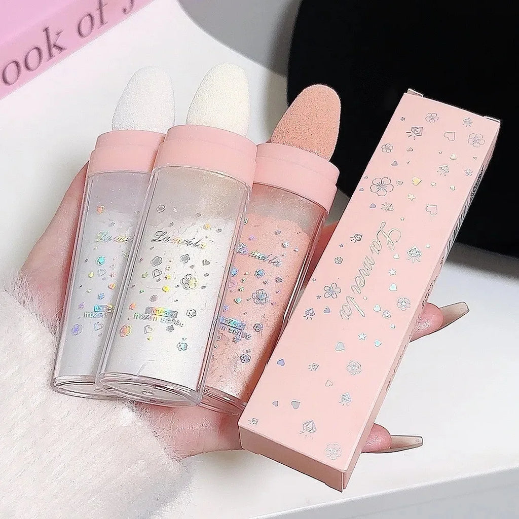Tidesmit 3-color glitter powder highlighter for face and body showing shimmering texture close-up for makeup contour