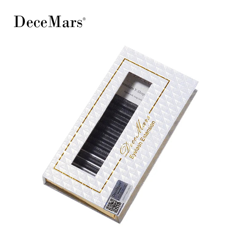 DeceMars YY black eyelash extensions in a white and gold patterned box with a clear display window.