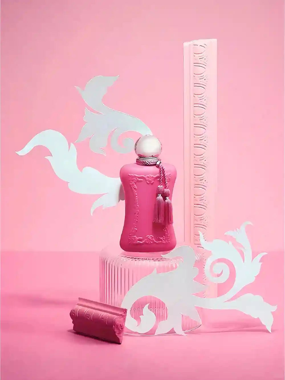 Parfums de Marly Delina 75ml EDP: Luxury floral women's perfume in a pink, ornate bottle with decorative tassel.