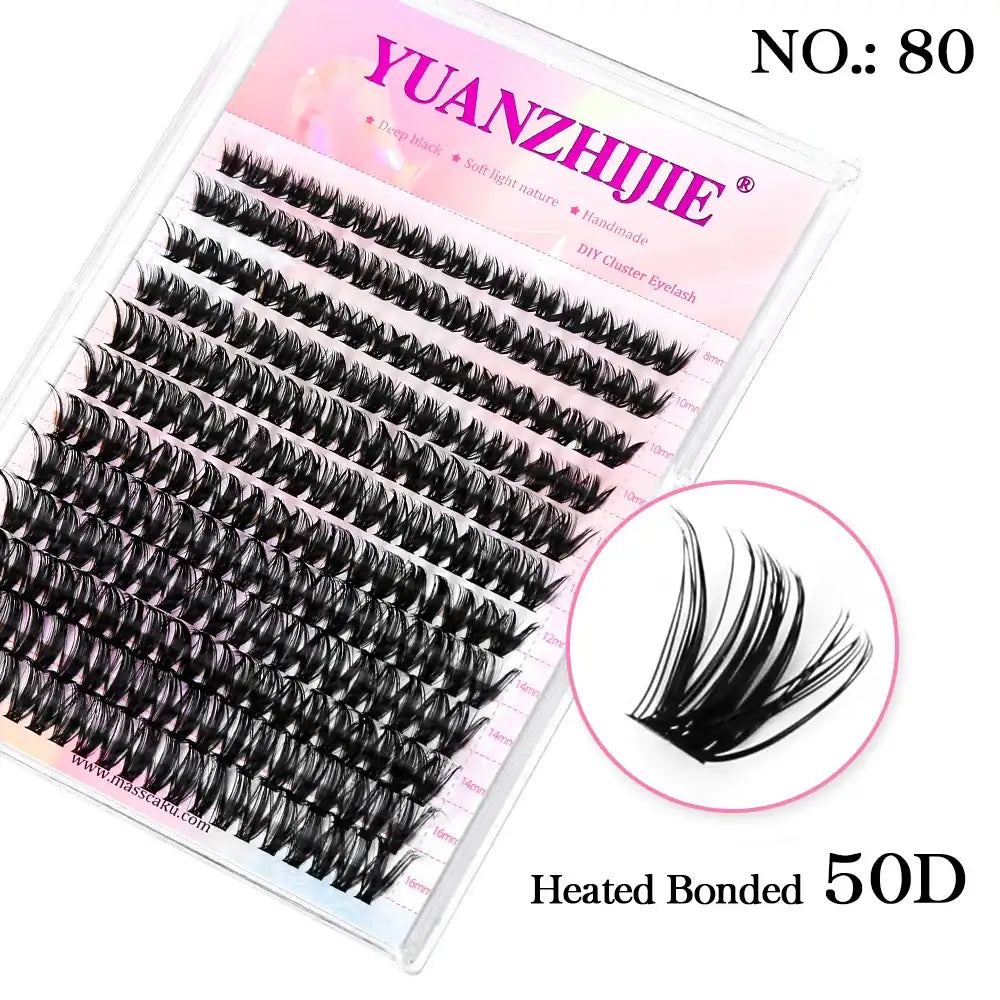 Clear tray of 144 black, segmented 50D mink cluster lashes in various lengths with a magnified view of a single cluster.