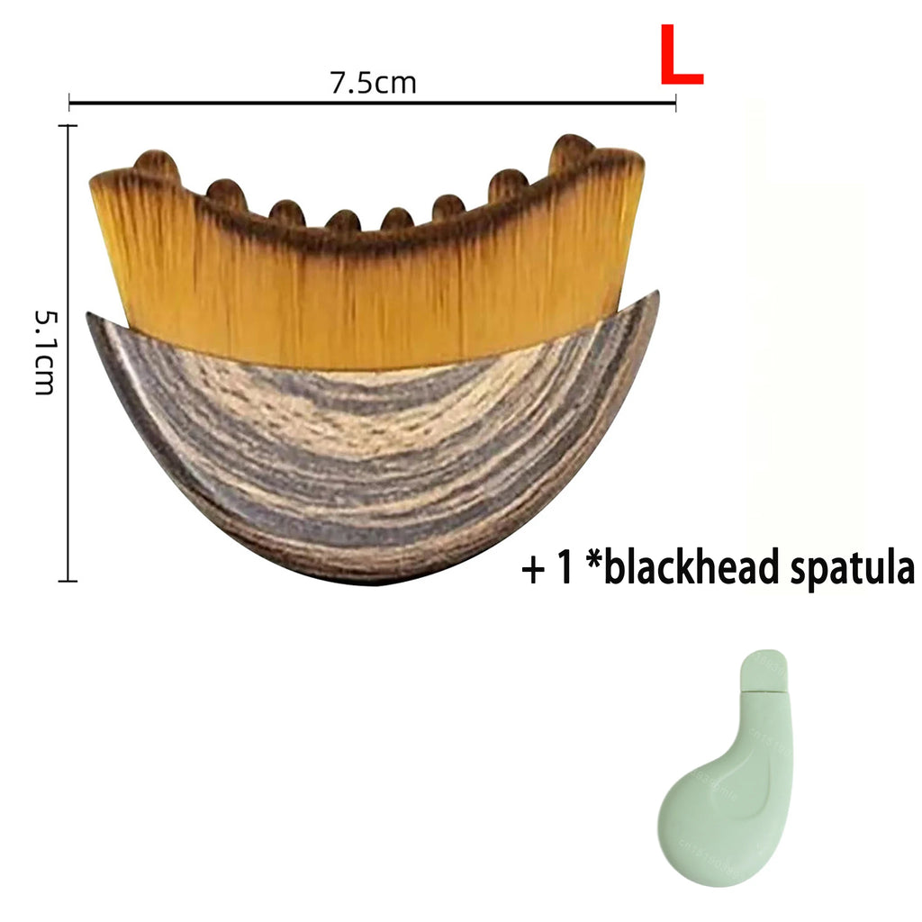 Crescent-shaped facial massage brush with brown bristles and wood-grain handle, plus a small green blackhead spatula.