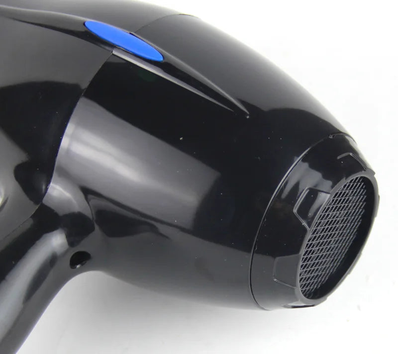 Glossy black professional hair dryer with blue button control and rear intake vent, perfect for salon or home use.