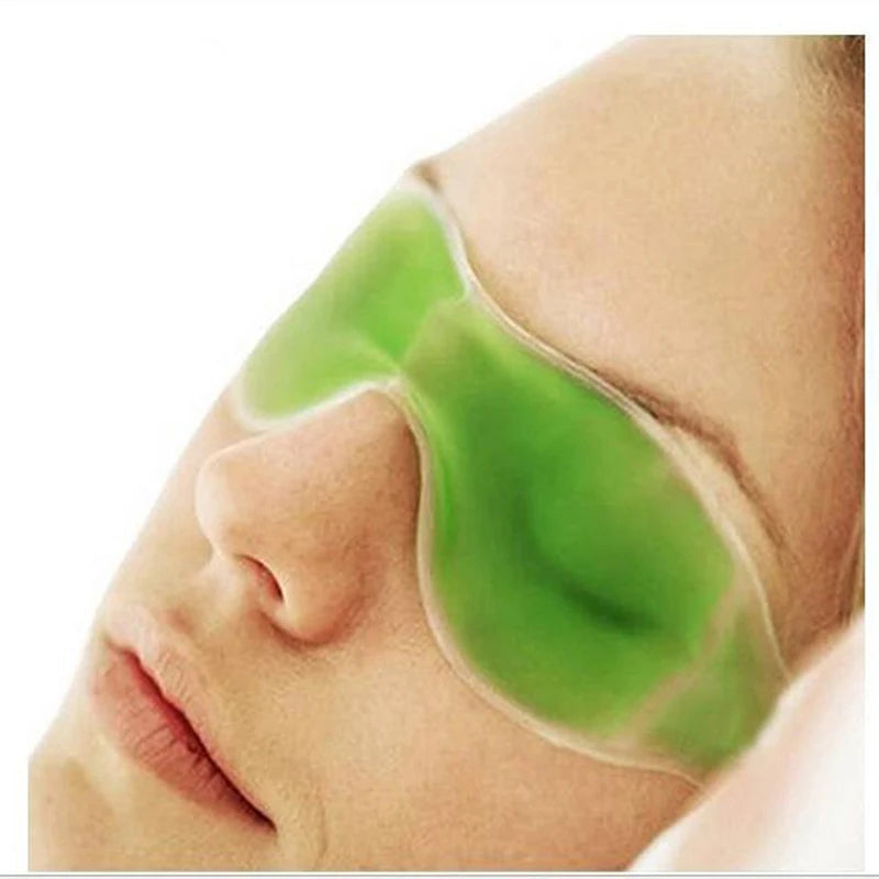 Green gel cold eye mask for sleep and stress relief worn over eyes for cooling therapy and insomnia treatment.