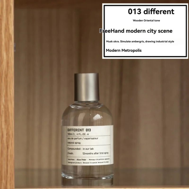 Different 013 unisex EDP 100ml: fresh sandalwood and fruity fragrance in a minimalist round glass bottle.