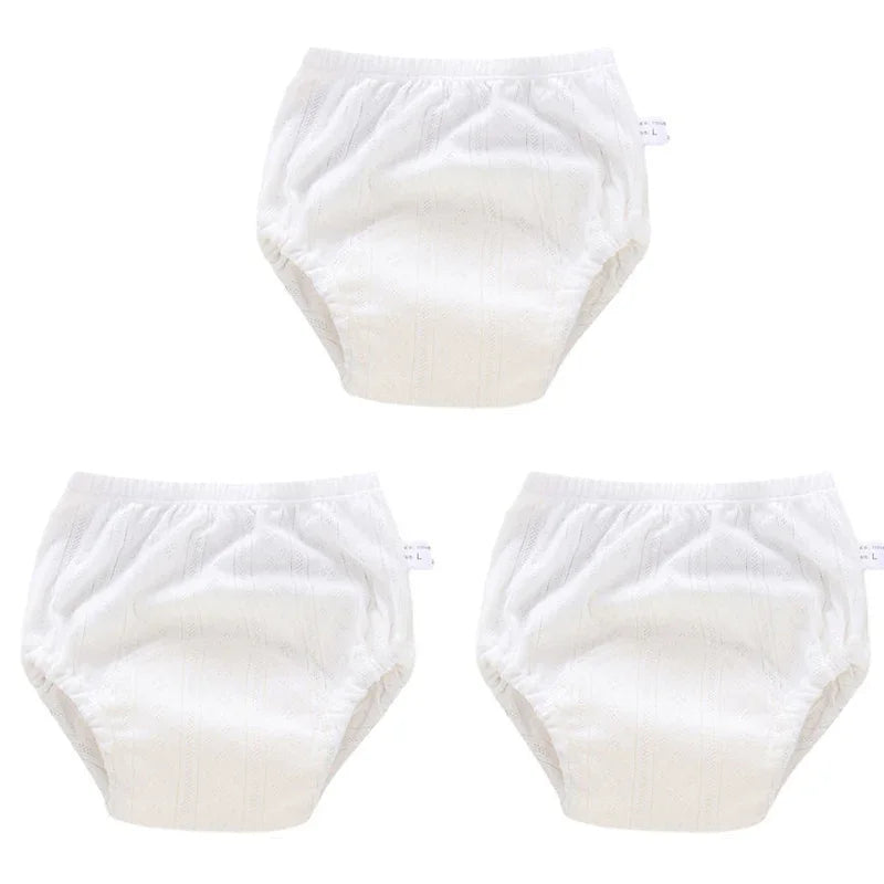 Set of 3 white baby training diaper pants, size Large. Breathable cotton cloth baby care diapers for toddlers.