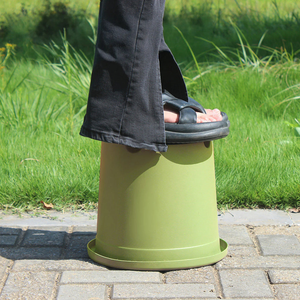 Green thick plastic self-watering flowerpot with rounded drip tray base