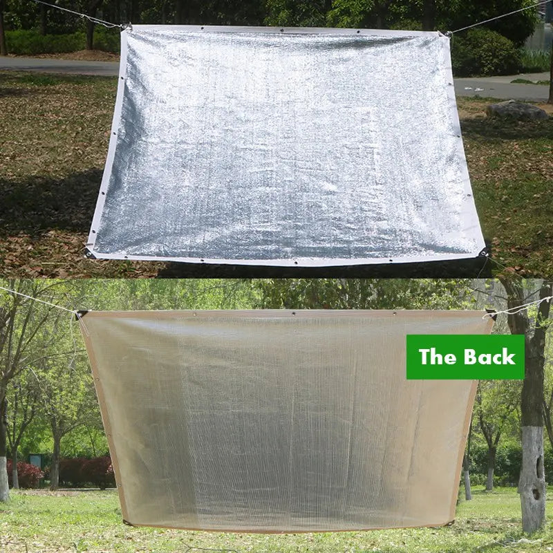 Rectangular silver and beige sunshade net panels with grommet openings for hanging
