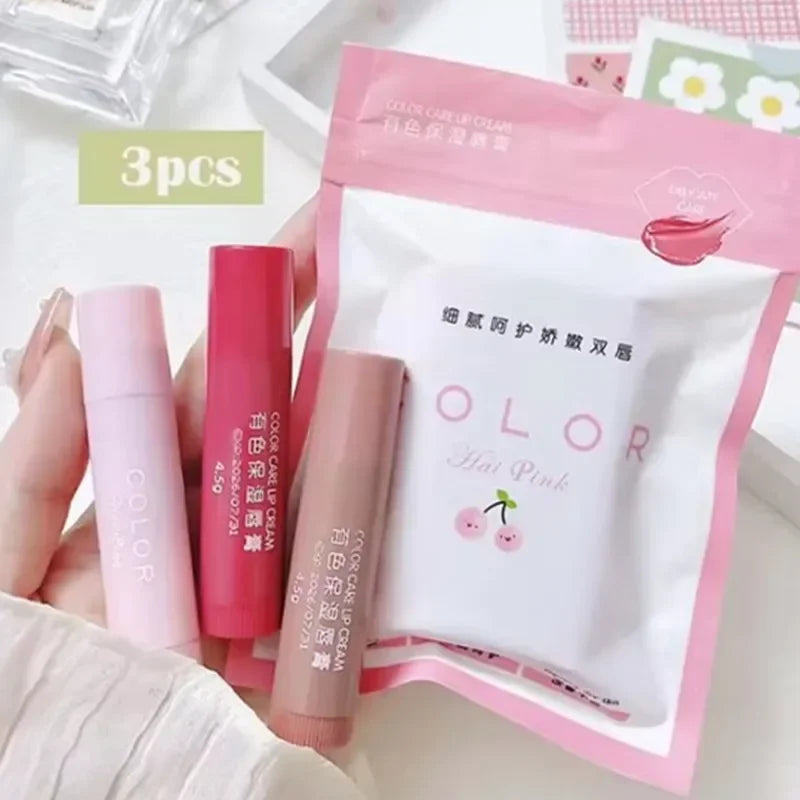 Set of 3 Korean moisturizing lip balms in pink, red, and nude shades with a cute cherry-themed packaging.