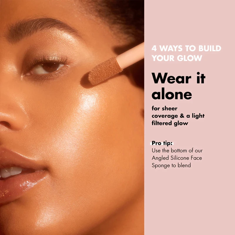 e.l.f. foundation applicator with glowing, dewy skin and glossy lips for a sheer, radiant, filtered makeup finish.