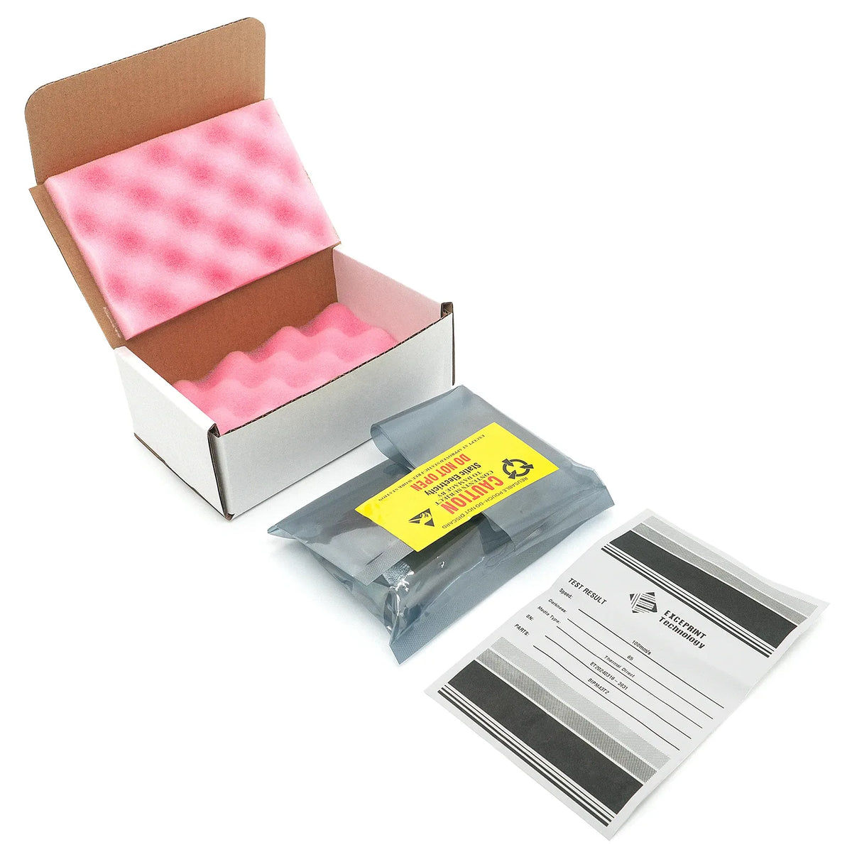 Thermal printhead box with pink foam, cables, and printed test labels