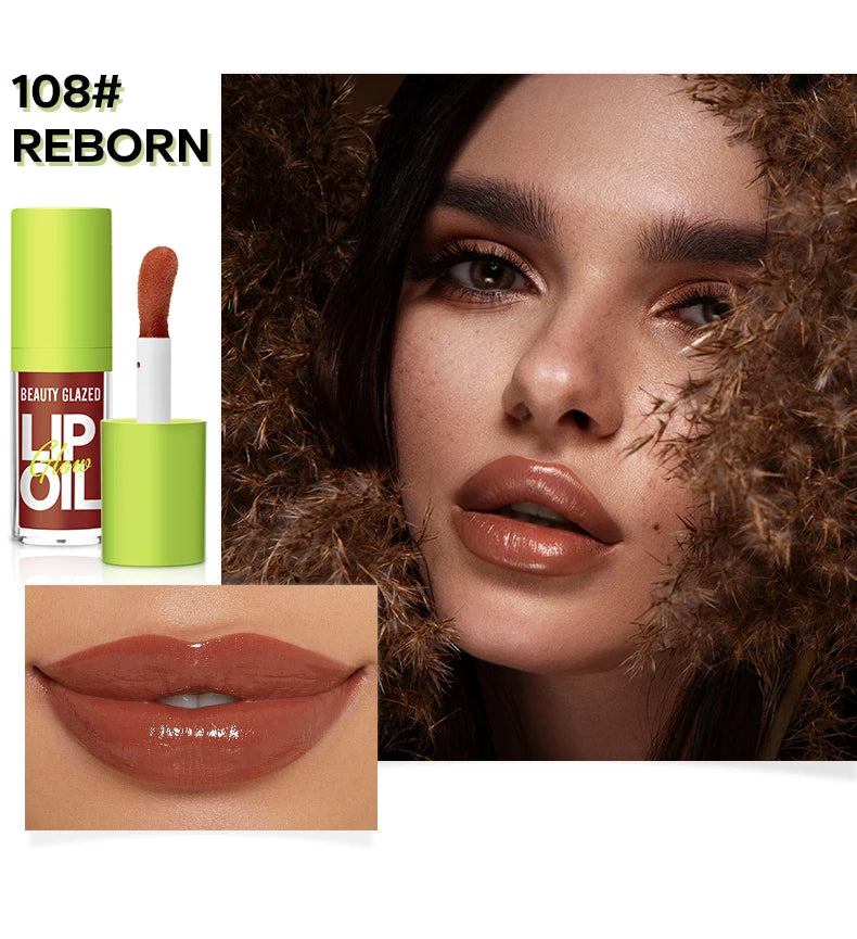 Moisturizing nude lip oil in 108# Reborn with a lustrous mirror-shine finish and high-shine applicator.