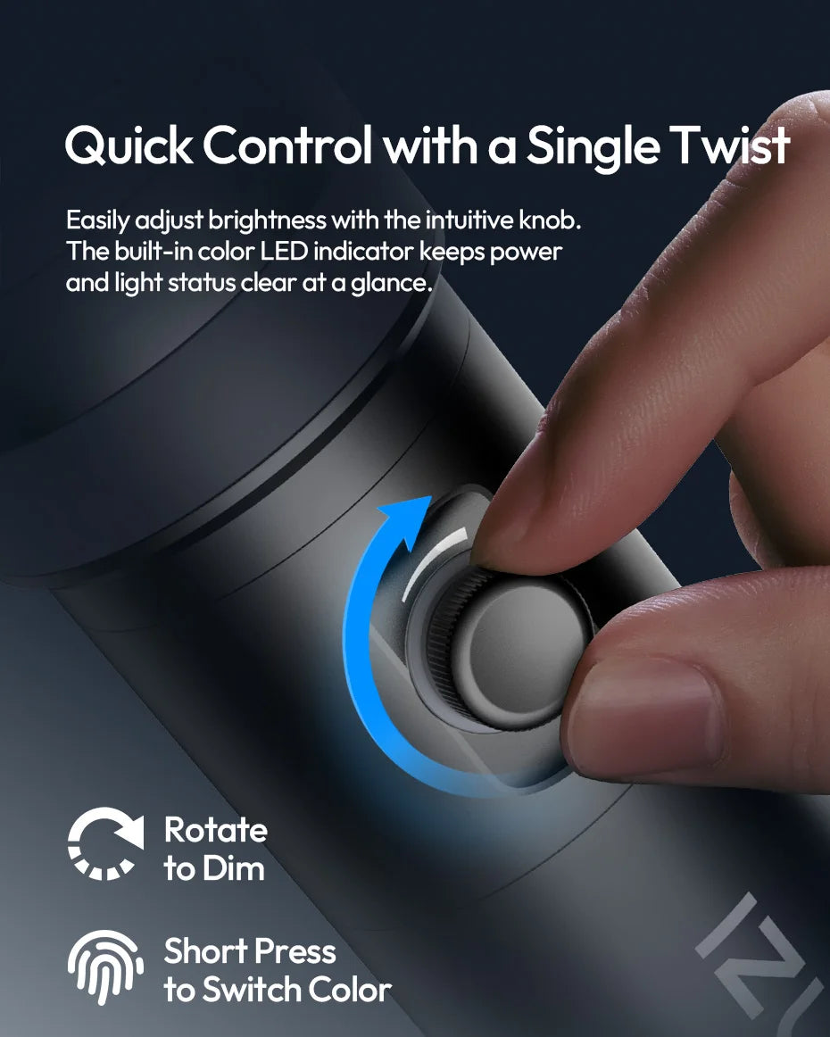 Matte black cylindrical light controller with a textured circular dial used for dimming and changing light color.