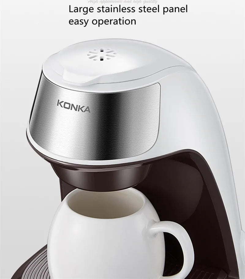 KONKA single-serve coffee maker in white with brushed stainless steel panel and a white ceramic mug.