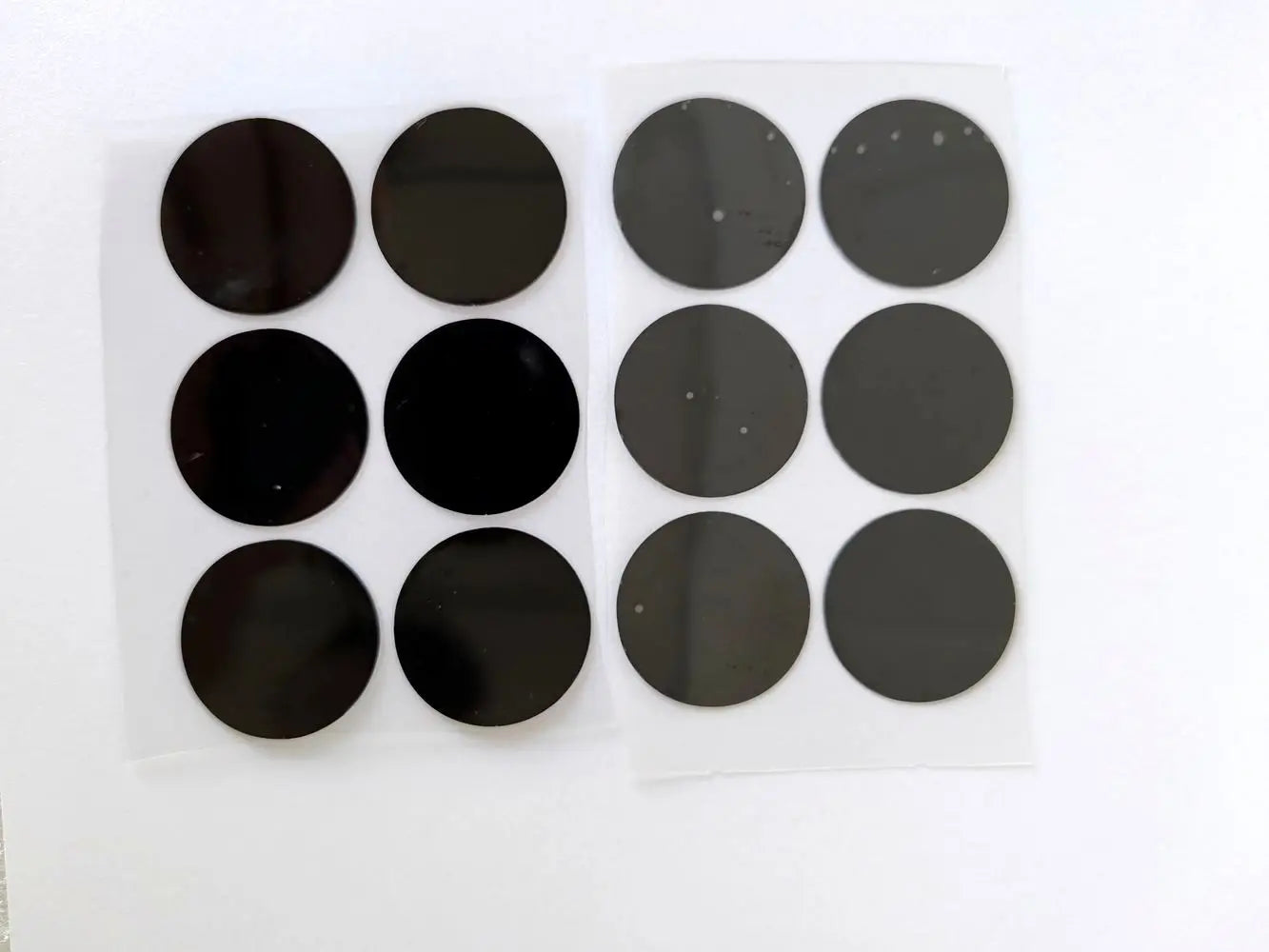 28mm black film stickers for Vmax Hifu cartridge replacement. Adhesive circular film sheets for aesthetic device parts.