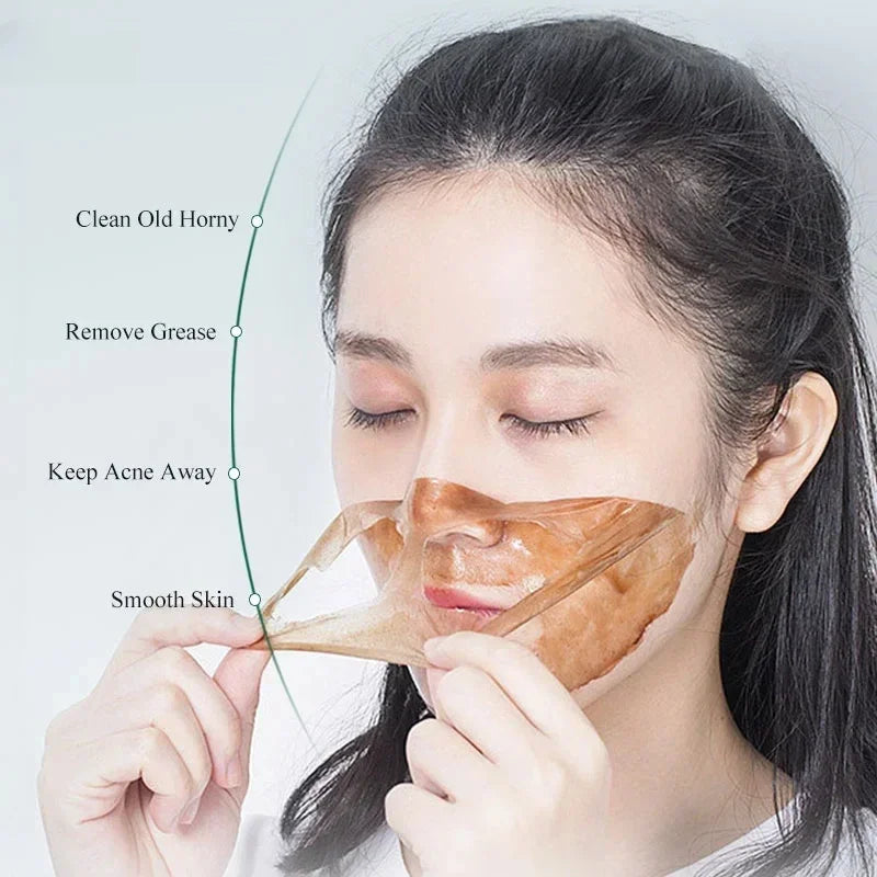 A woman peeling off a thin, translucent brown facial mask from her nose and cheeks with labels highlighting benefits.