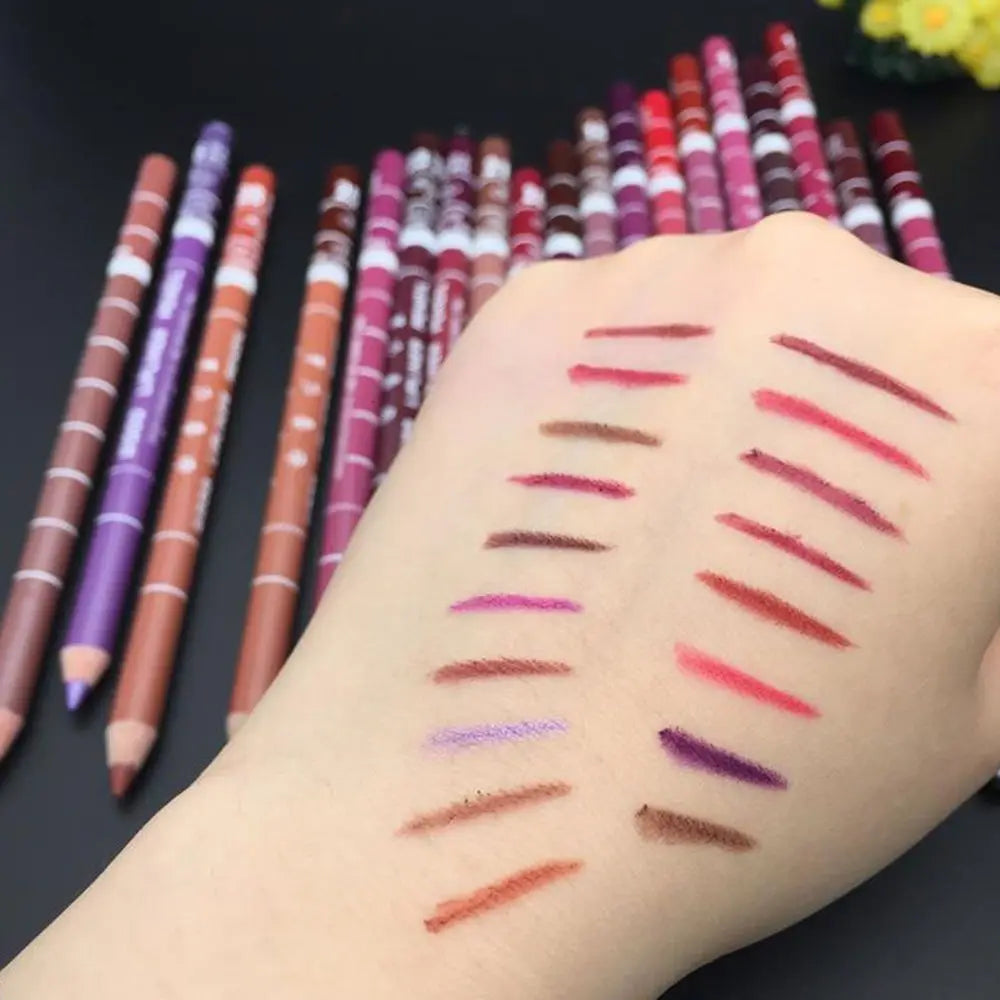 Professional waterproof lip liner pencils showing multi-colored matte swatches on hand for long-lasting makeup.