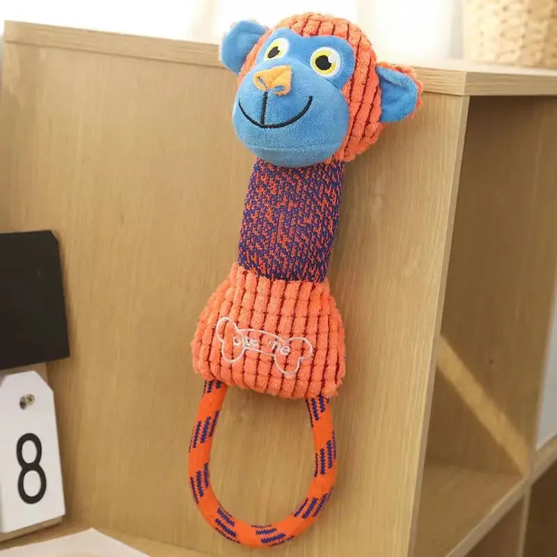 Cute monkey plush dog rope toy for interactive chewing, squeaky play, and cleaning puppy teeth. Orange and blue.