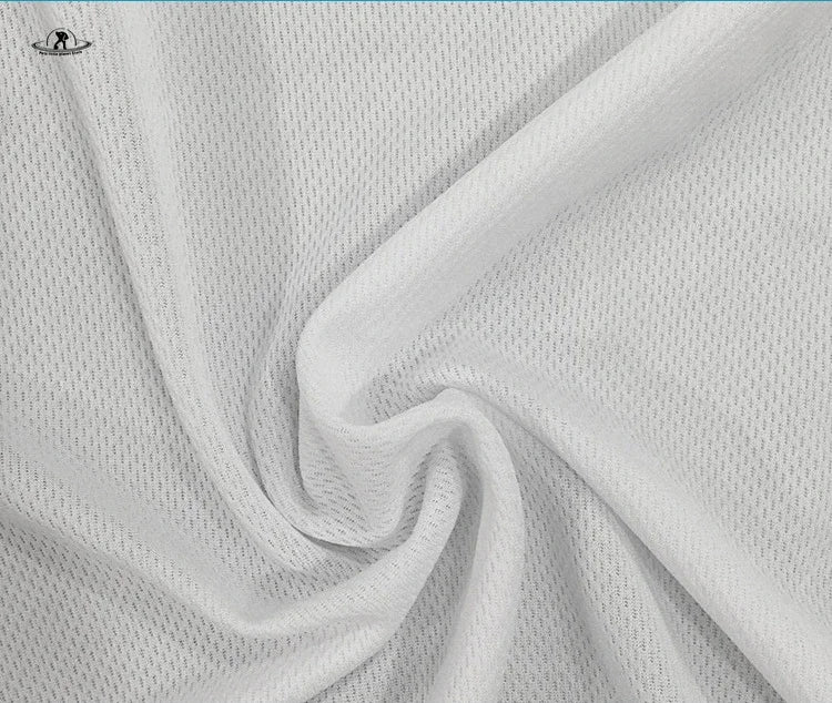 Close-up of white breathable mesh fabric for summer pet shirts, perfect for cool and comfortable small dog clothing.
