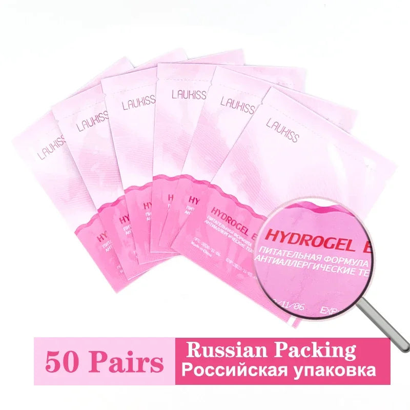 Pink Laukiss hydrogel eyelash patches for lash extensions in individual sachets. Set of 50 pairs for professional use.