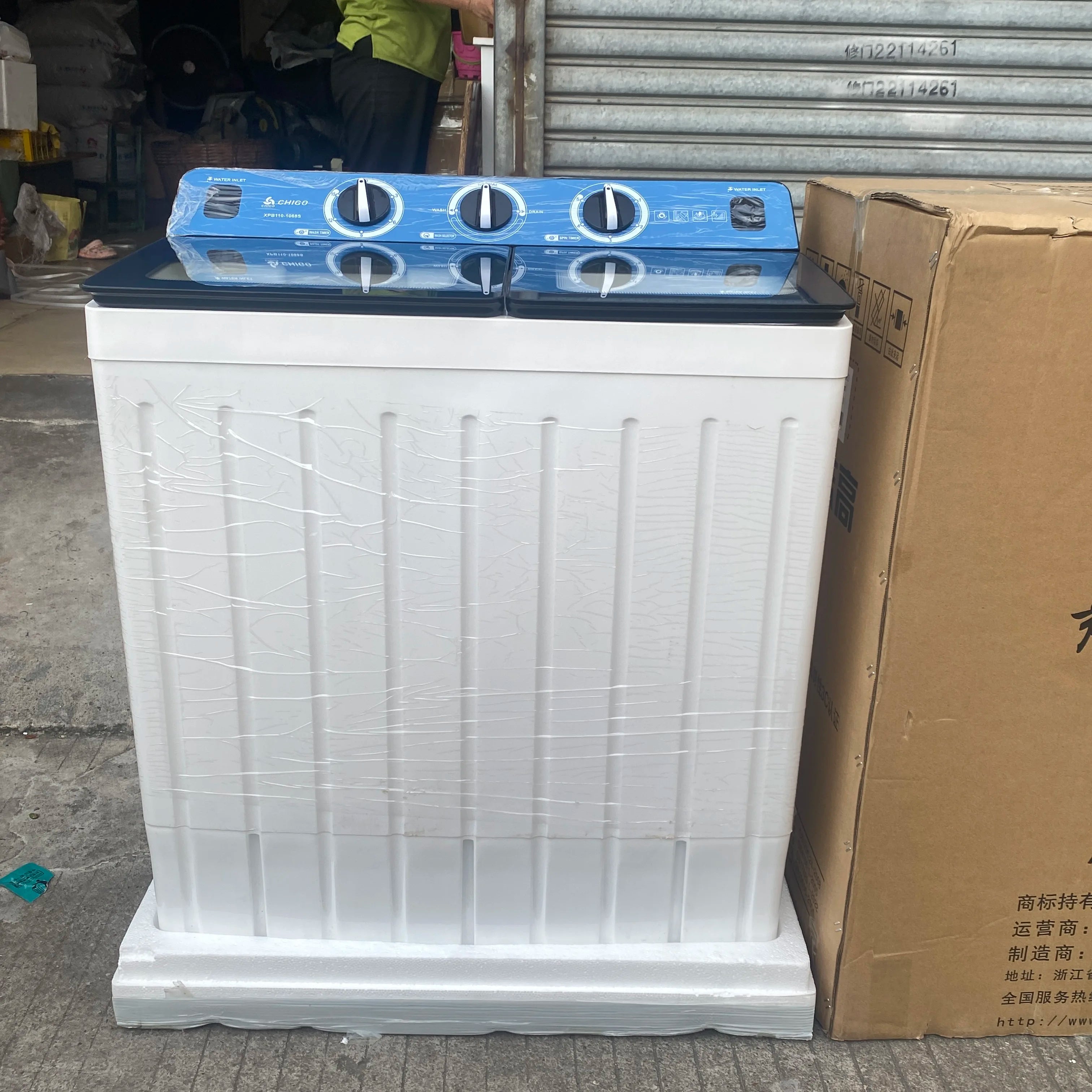Tidesmit 11kg twin tub washing machine showing internal drum features and durable side control panel design.