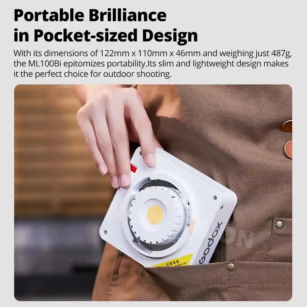 ML100Bi compact square LED video light with a white housing, held by hand near a pocket for portable photography.