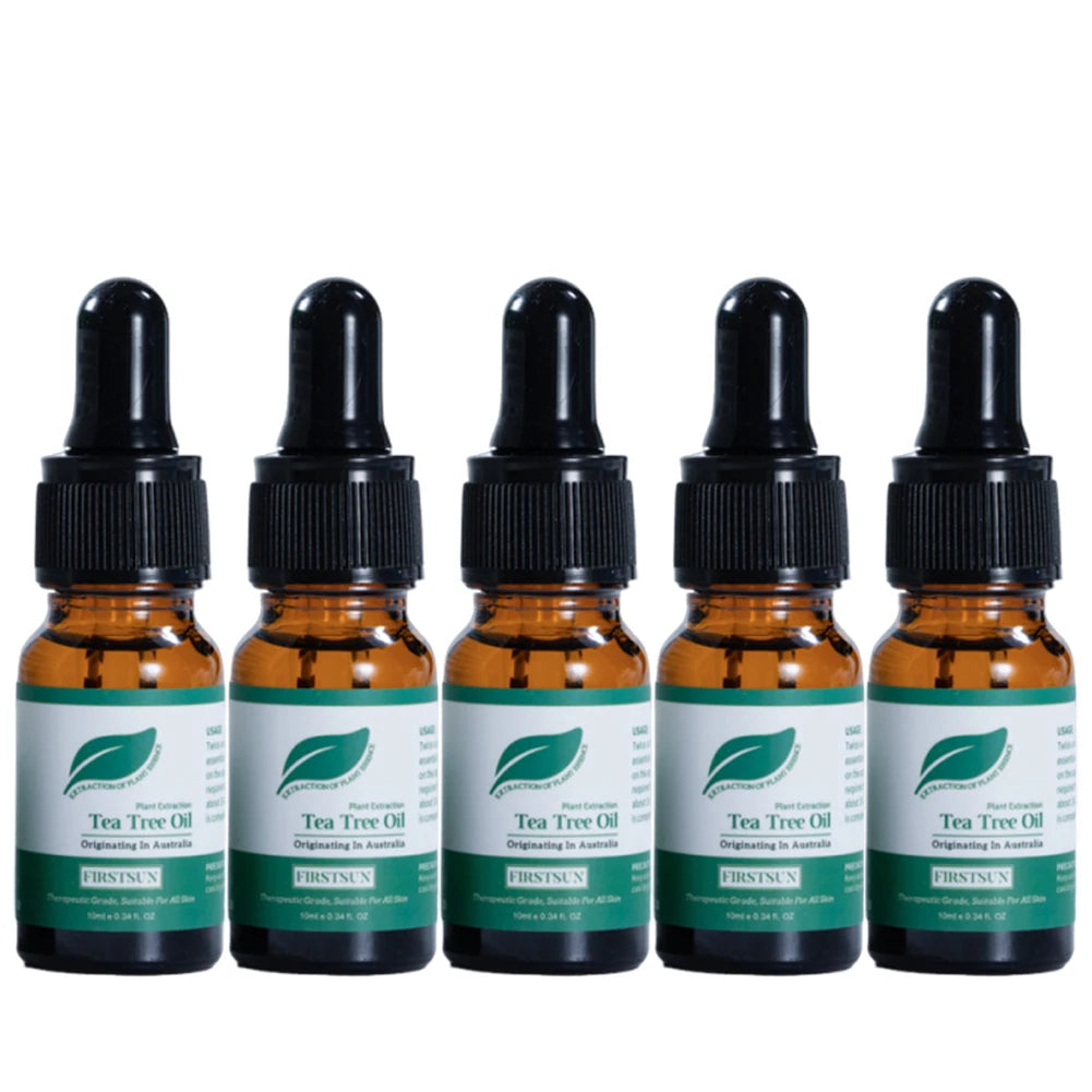 Set of five tea tree oil bottles with black droppers and green labels