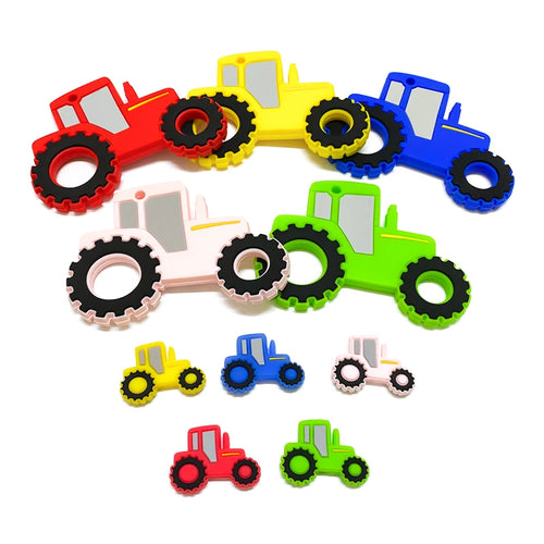 Colorful silicone tractor teething toys for baby relief in red, yellow, blue, green, and pink.