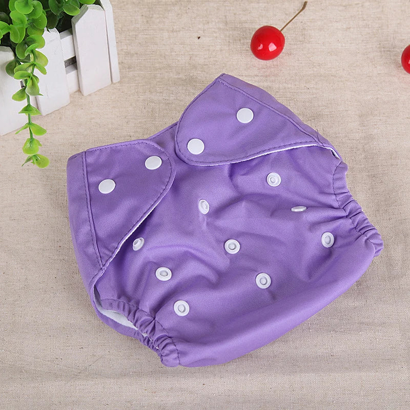 Purple reusable cloth baby diaper with adjustable white snaps for a customizable fit.