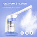 Professional white and blue nano ionic facial steamer for deep cleaning and skin hydration with mist nozzle.