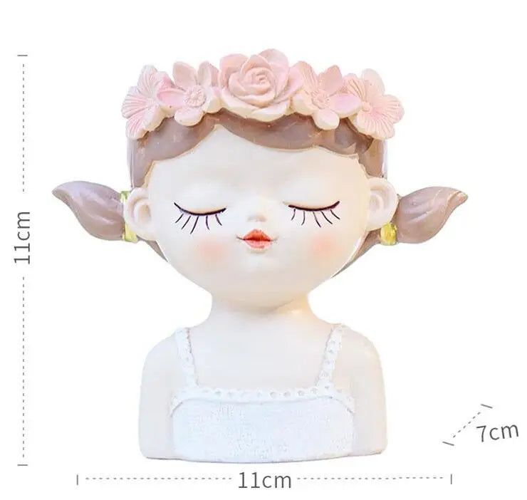 Elf-style girl succulent planter with pink floral crown and closed eyes