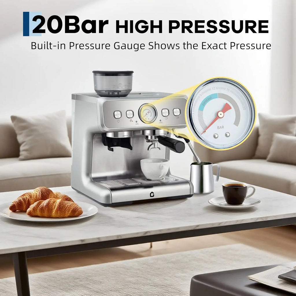 Silver 20-bar espresso machine with built-in pressure gauge and grinder on a marble table with coffee and croissants.