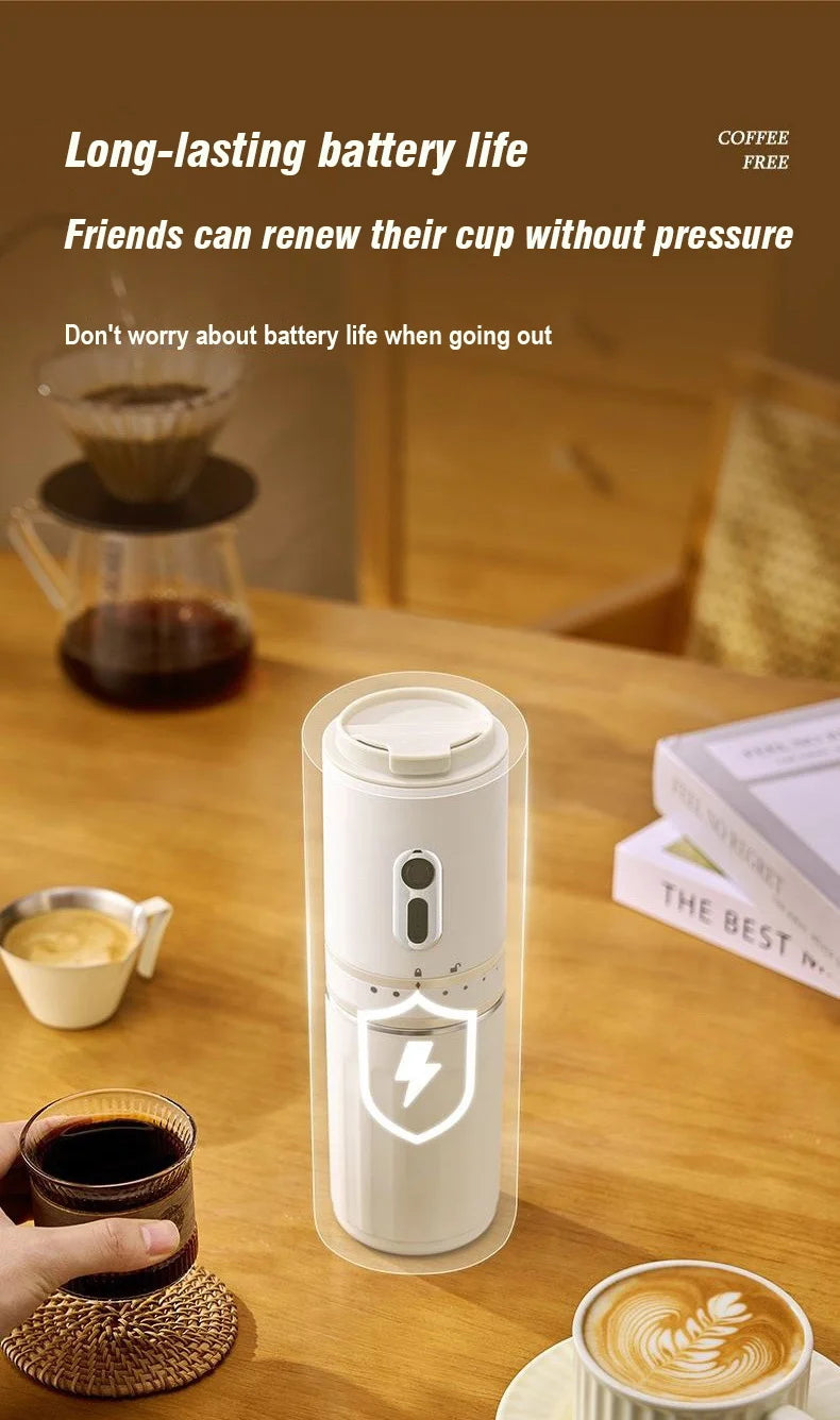 Portable white electric coffee maker on a wooden table, featuring long-lasting battery life for travel and camping.