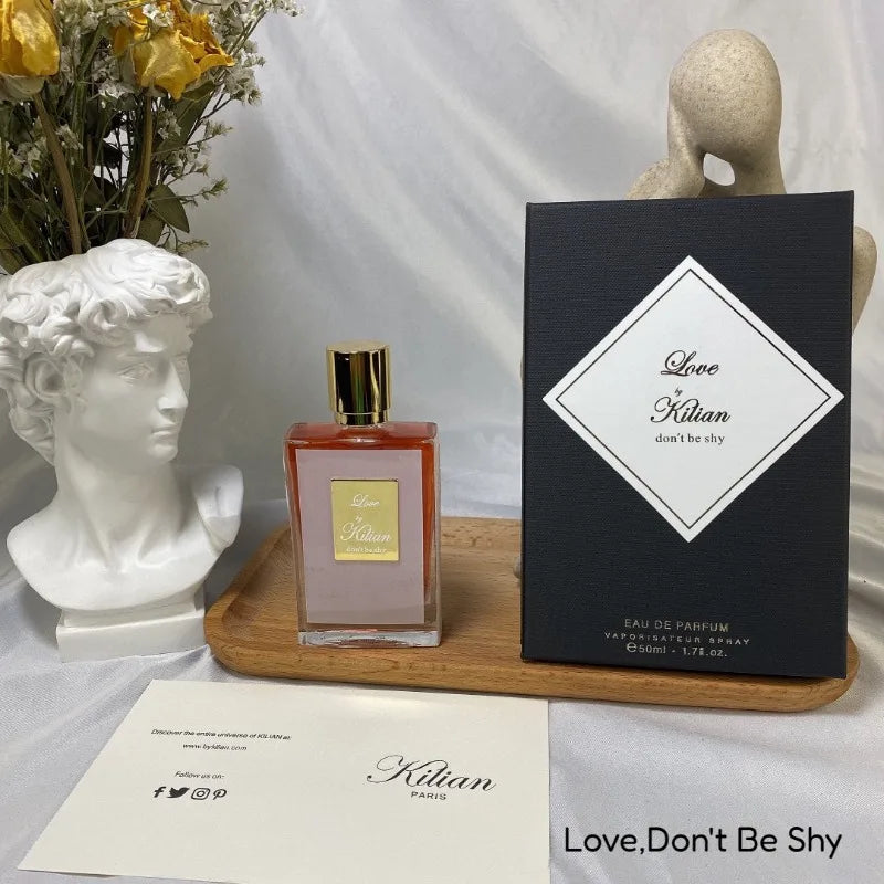 Kilian Love Don't Be Shy EDP: Square 50ml unisex niche perfume, oriental floral fragrance, warm spicy scent, gold cap.