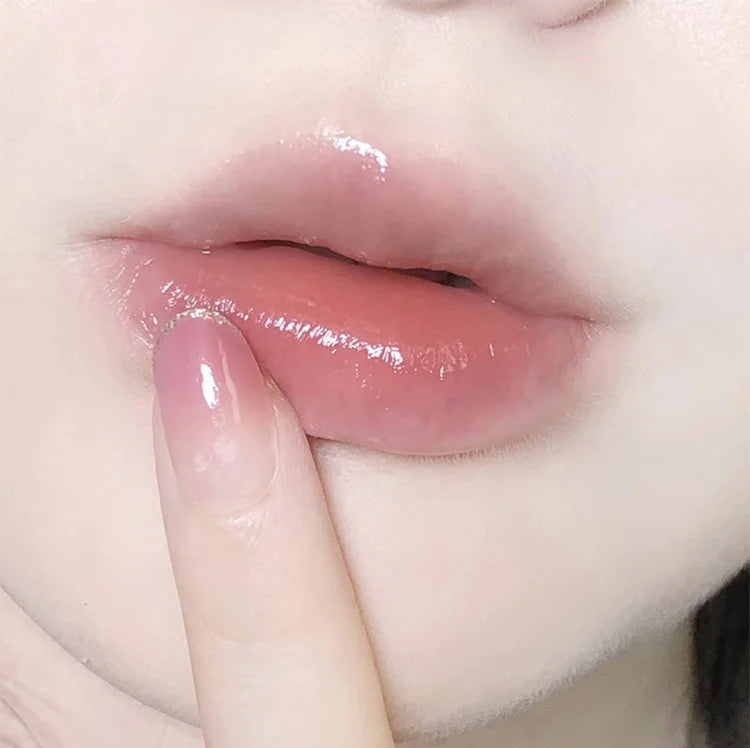 Gege Bear cherry lip oil for glossy, hydrated, and tender pink lips with a smooth, moisturizing finish.
