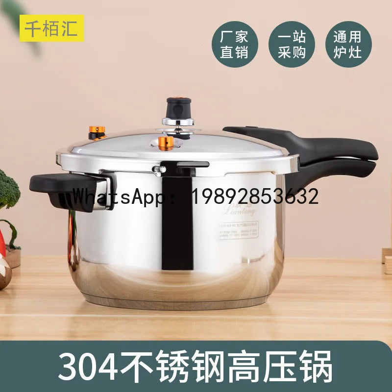 Large stainless steel pressure cooker with black side handles and lid knob