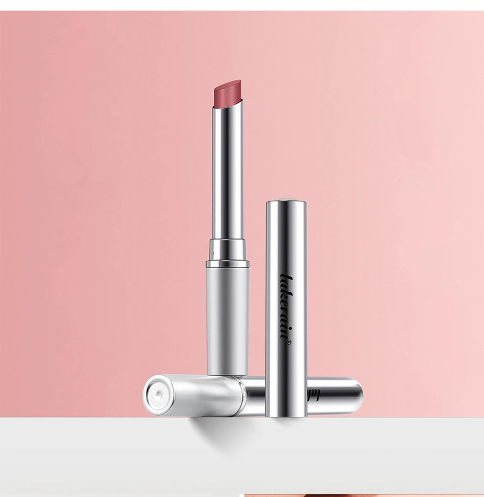 Nourishing tinted lipstick in a sleek silver tube. Smooth, moisturizing lip makeup with a natural mauve-brown finish.
